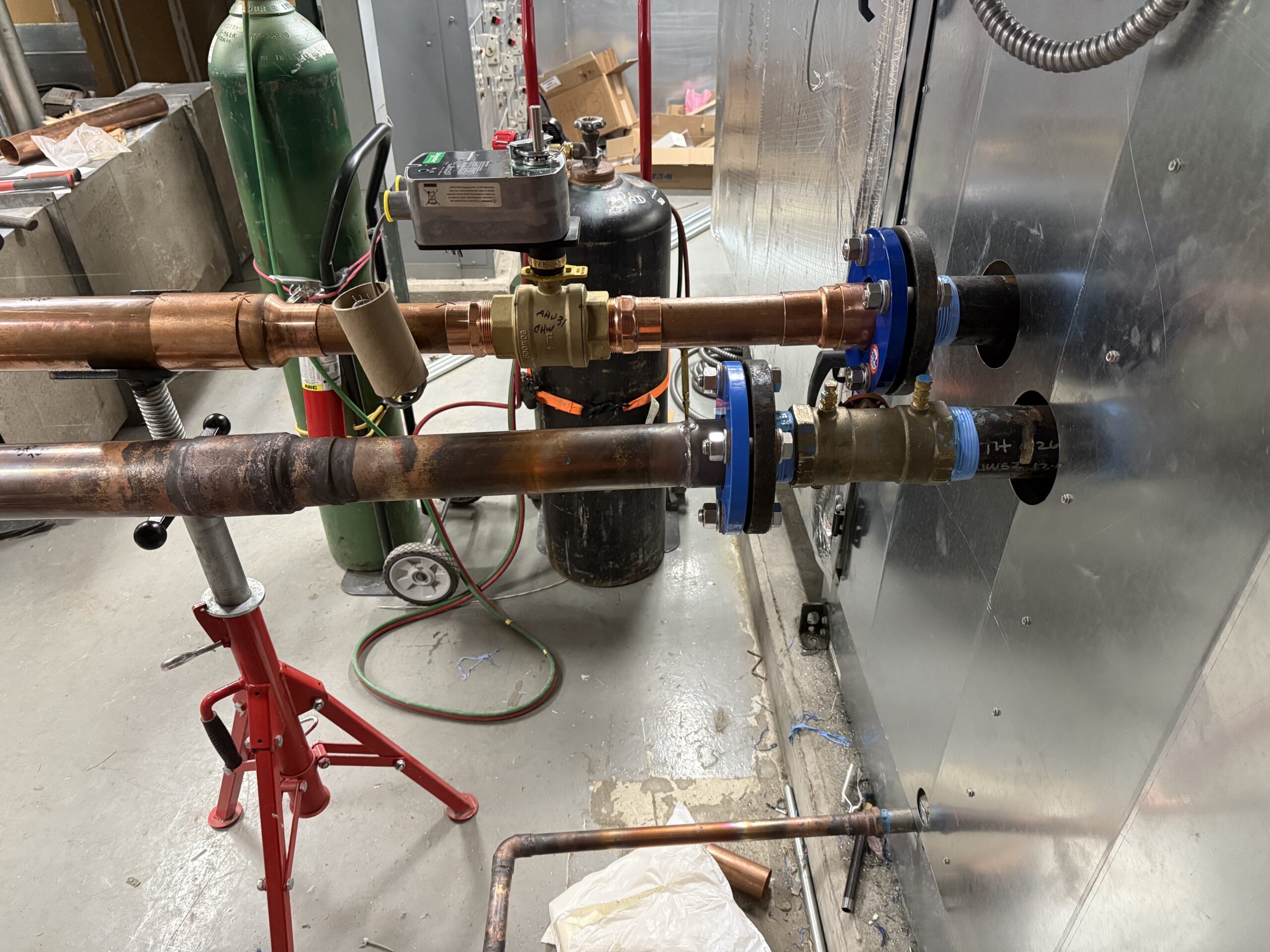 Commercial hydronic piping valves gauges and equipment connections