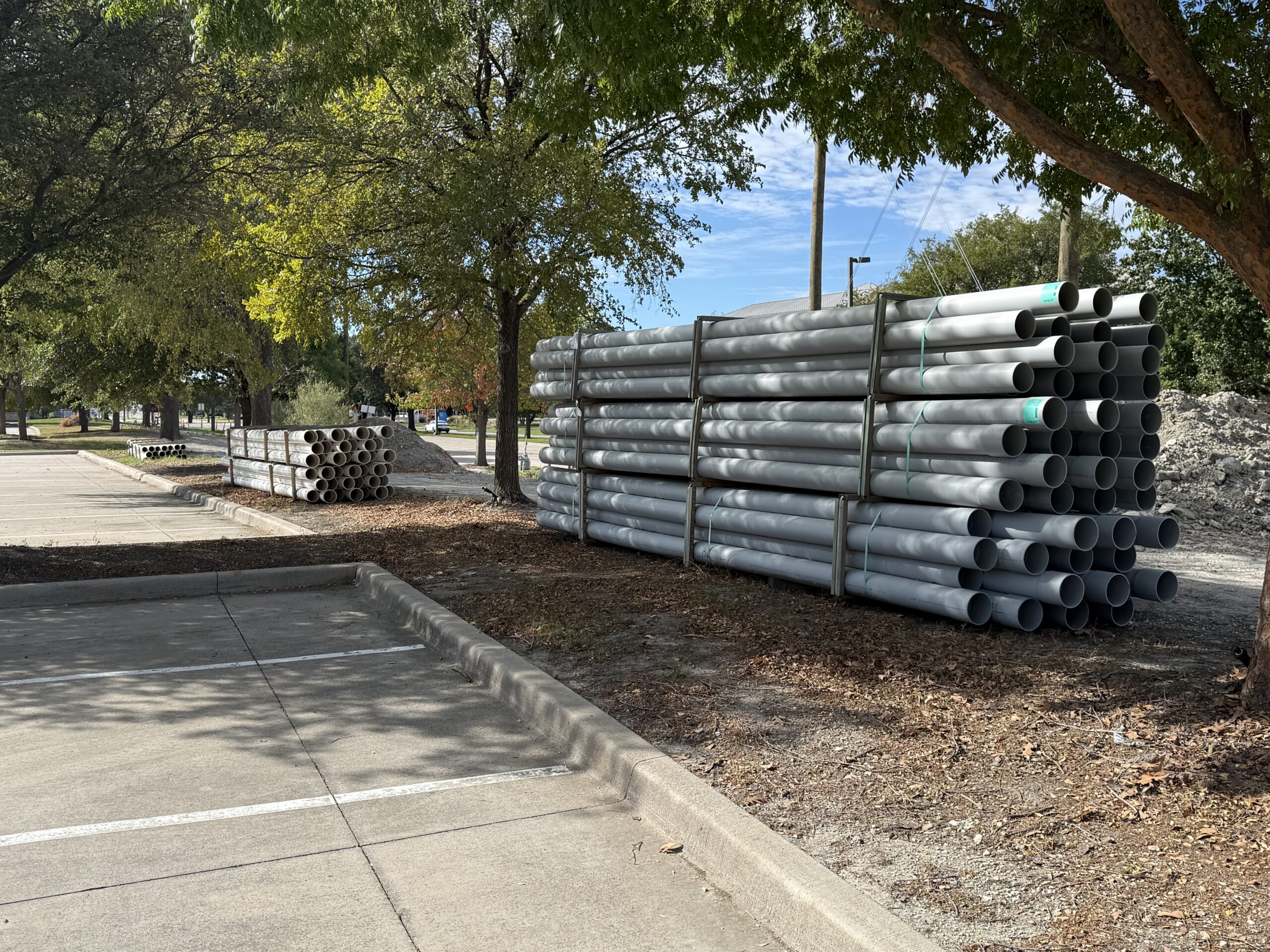 Large-diameter piping staged for water and infrastructure construction